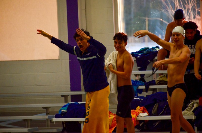 Sussex Academy senior Angel Figueroa leads the cheering charge.