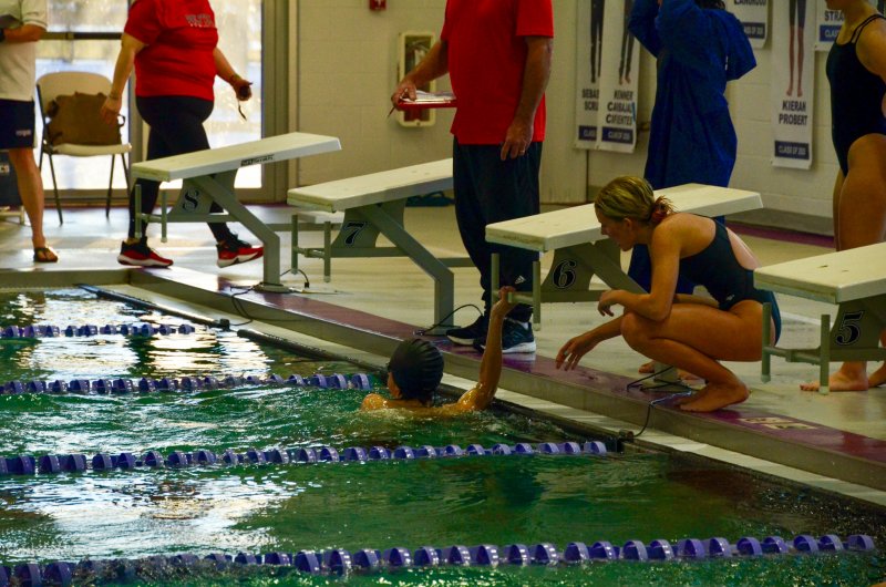 Seahawks junior June Hale congratulates her brother Eddie after he won a close 500.