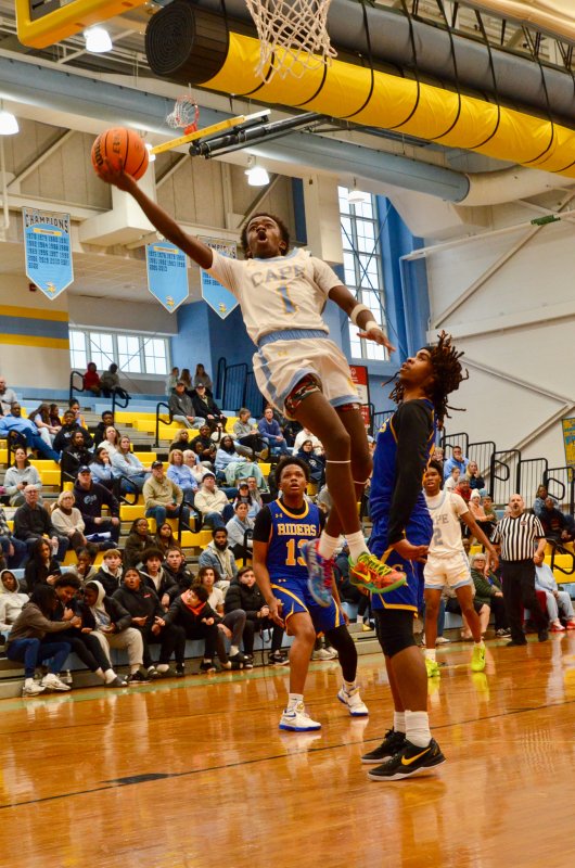 Vikings junior Steve Sivels takes flight for a couple of points. AARON R. MUSHRUSH PHOTO