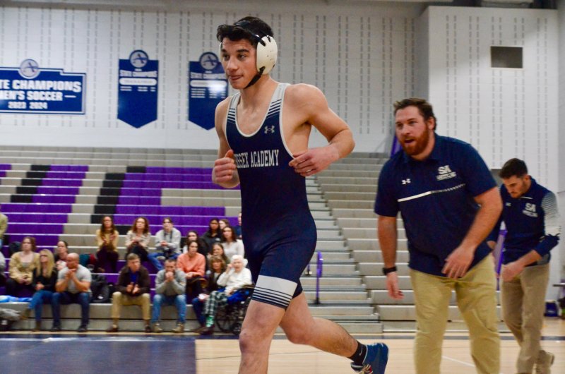 Sussex Academy senior Ryan Buckler takes the mat against Lake Forest Feb. 4. He capped off his Senior Night with a pin.