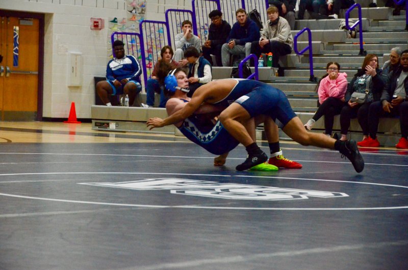 Sussex Academy junior Cleverson Ortiz-Dionicio went for a shot but Kolton Pieller uses the momentum to gain the upper hand.