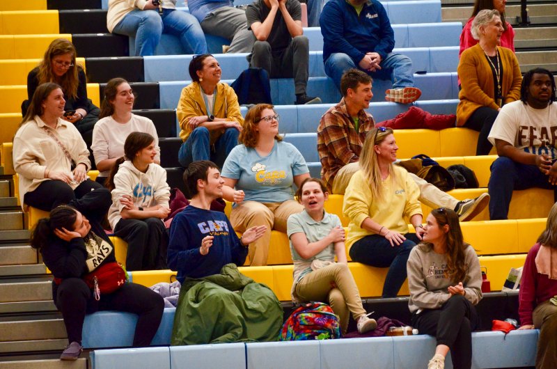 Former unified players, classmates and friends encourage the Vikings to play defense.