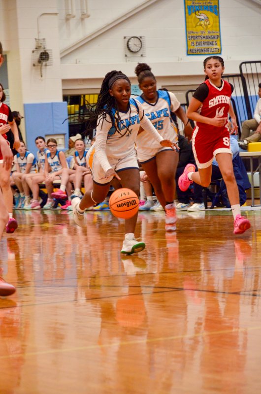 Mariner seventh-grader Melody Sivels progresses toward the arc.