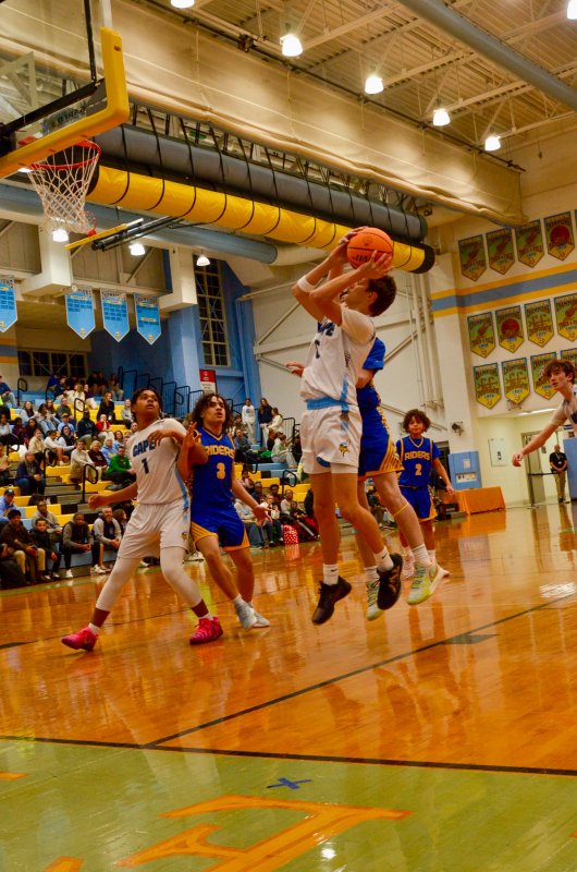 Fred Thomas eighth-grader Robbie Myers shoots a high-percentage shot.