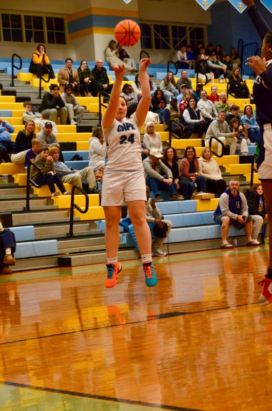 Fred Thomas seventh-grader Cali Smith releases her shot.