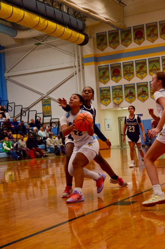 Fred Thomas eighth-grader Malia Jackson heads up for two.