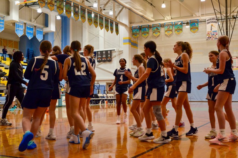 Sussex Academy girls’ basketball celebrates their 29-28 win made possible by a lay-up as time expired to defeat Fred Thomas Middle School in the Capital Classic Feb. 9. AARON R. MUSHRUSH PHOTOS