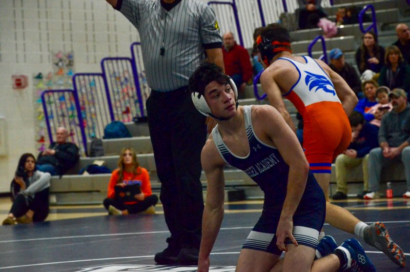 Seahawks senior Ryan Buckler looks at his coaches for his second period starting position.