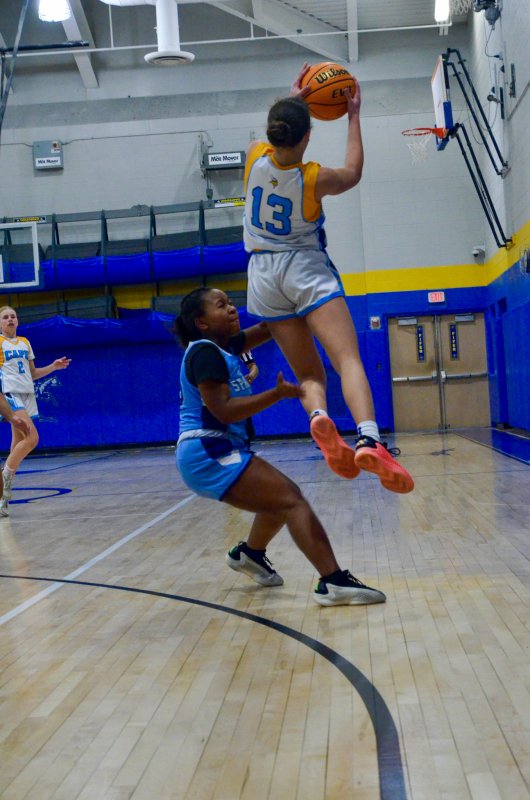Beacon eighth-grader Addison Wilson leaps up for a pass.