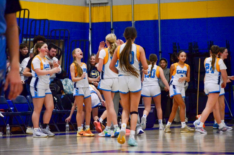 Beacon celebrates seventh-grader Aaliyah Fruchtman’s buzzer beater to end the first half.