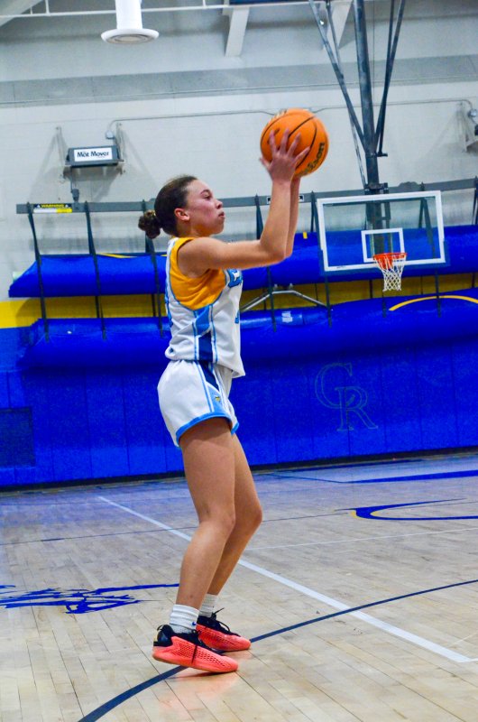 Beacon eighth-grader Addison Wilson shoot a long two.
