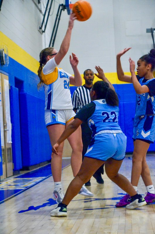 Beacon eighth-grader London Steigerwalt leaps up to escape trouble.