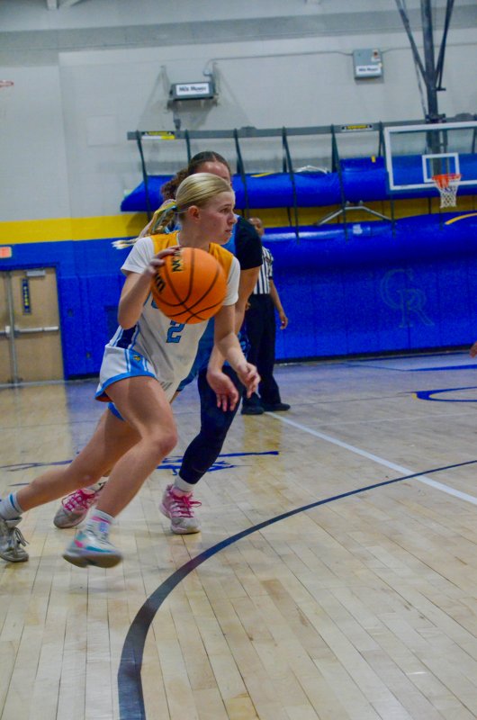 Beacon eighth-grader Kelly Neustadter drives inside.