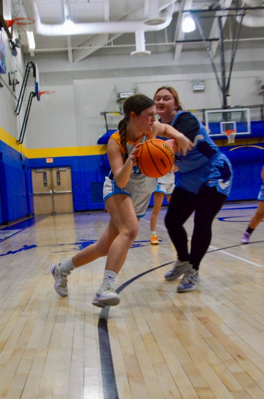 Beacon eighth-grader Emma Rowley drives into the arc.