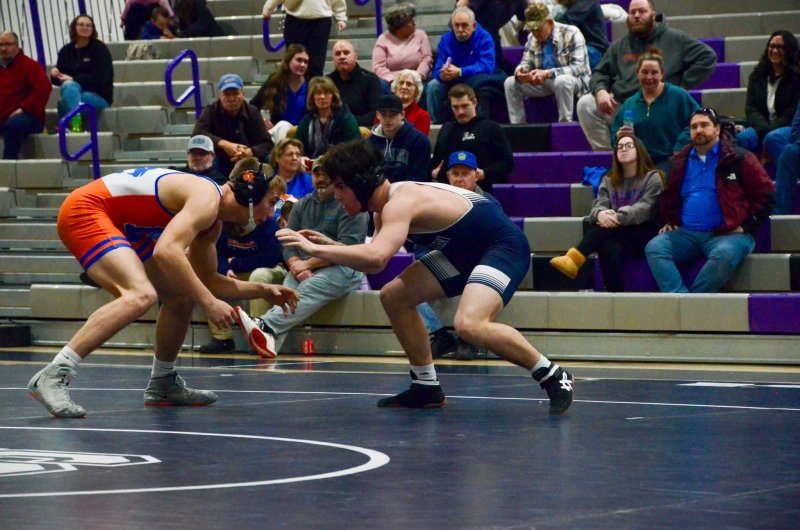 Seahawks freshman Charlie Bowman feels out his opponent early in the first period.