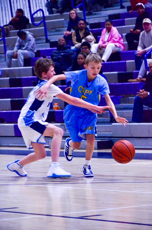 Beacon seventh-grader Harrison Hayes tries to beat his defender.