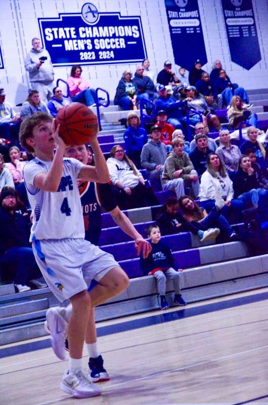 Fred Thomas seventh-grader James Frederick puts up a floater.