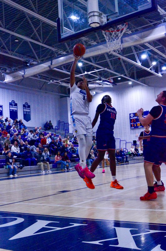 Fred Thomas eighth-grader Arristyn Richards puts two in.