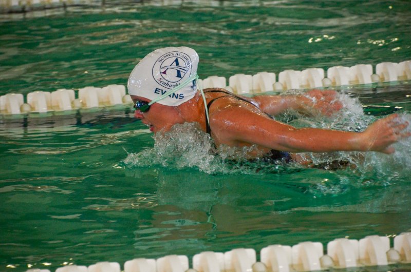 Seahawks senior Victoria Evans bursts forward in the butterfly.