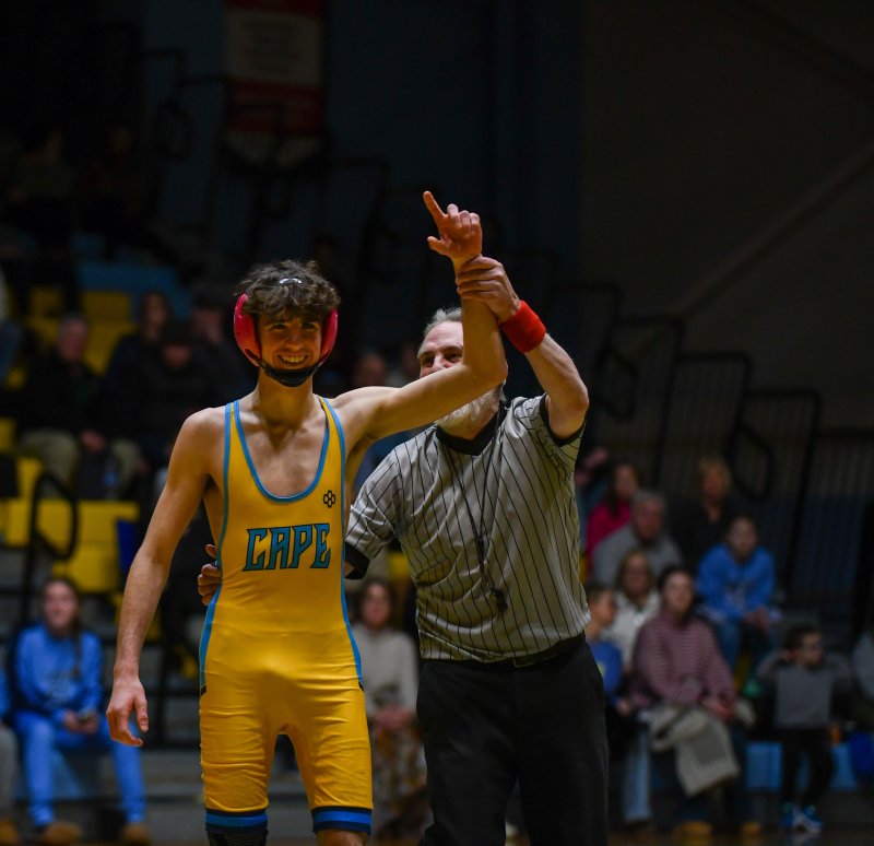 Austin Guerrieri happily accepts forfeit at 126 pounds against Dover.