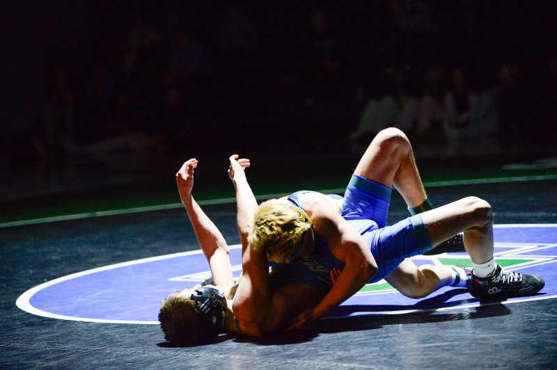 Blake Walker gets back points over Albert Weismiller.