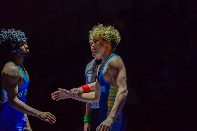 Grayson Davis doesn’t stay around long, pinning Isaiah Scott in 23 seconds.
