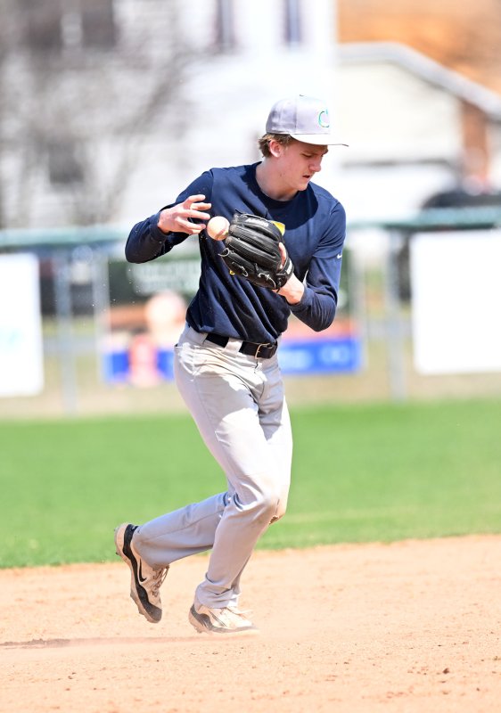 Cape shortstop Joe Ruark transfers the ball and throws out a Red Lion batter.