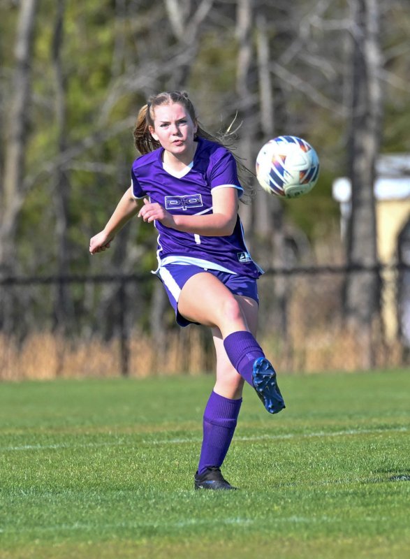 Royals Alyse Potter clears the ball out of the Delmarva Christian zone.