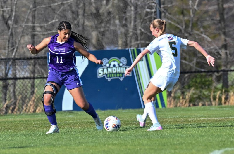 Royals senior defender Eva Elliott plays tough defense on Indian River’s Grace Clark.