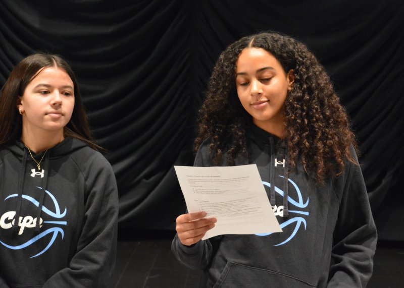 Naisae Ngido reads one of the scenarios for her breakout group to discuss. At left is Morgan’s Message teammate Jerny Haines.