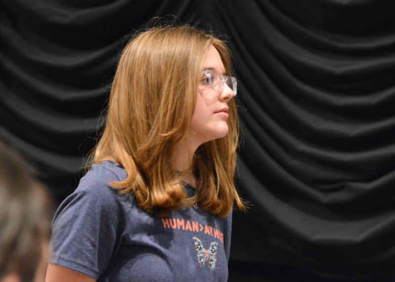 Gwynn Fentress listens as her peers talk about ways to recognize stress in their teammates.
