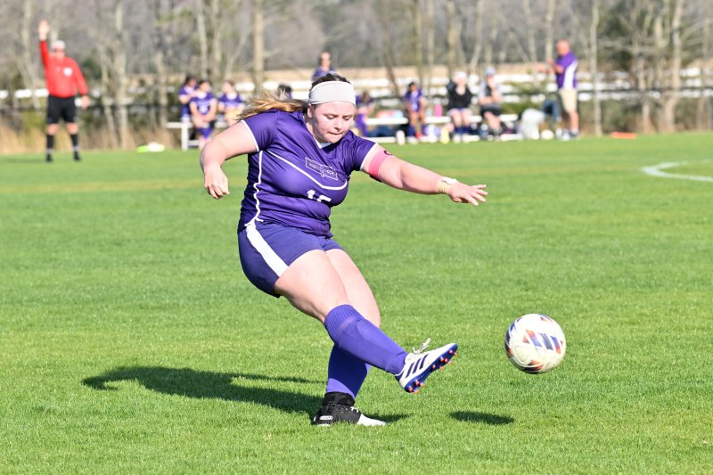 Senior Emelia Faubert clears the ball for the Royals.