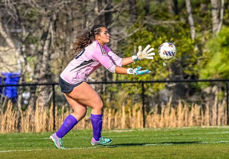 Royals keeper Tori Royster cuts off the angle and makes a save.