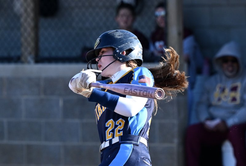 Cape sophomore first baseman Lyla Hunsberger slams a hit for the Vikings.