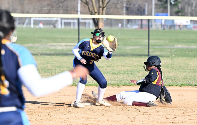 Cape sophomore second baseman Mia Scott snags Jordyn Bowe throw for a close play at second.
