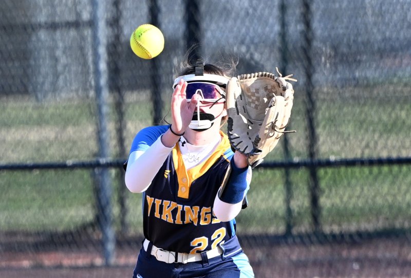 Cape sophomore first baseman Lyla Hunsberger grabs a throw for a put out.