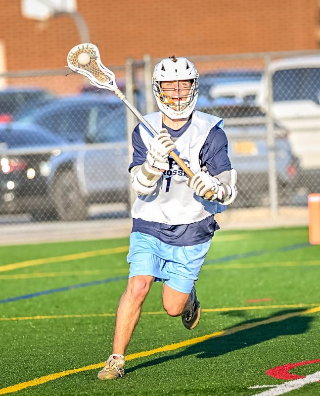 Braddock Smith looks to pass to the Bucs’ crease.