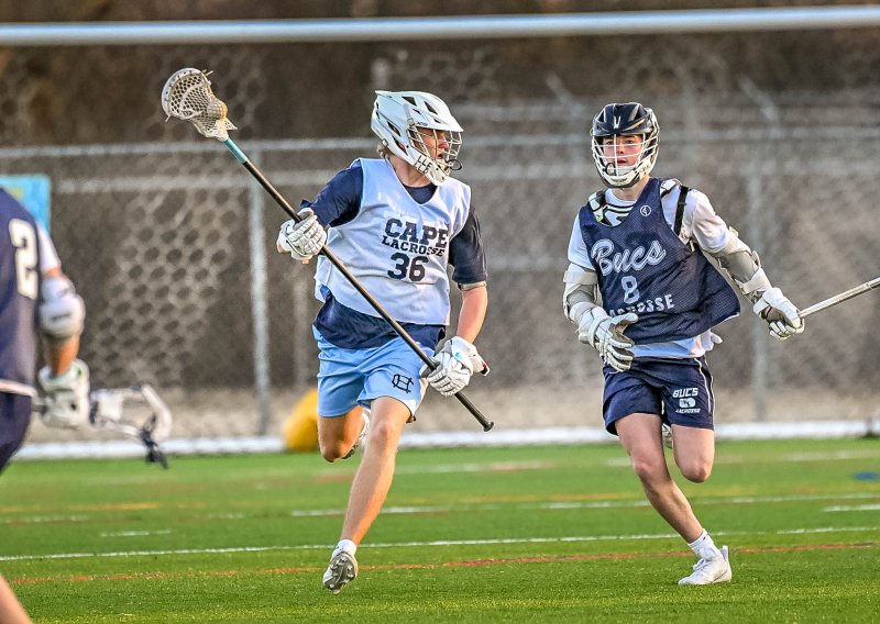 Cape defender Tate Mauro makes a successful clear.