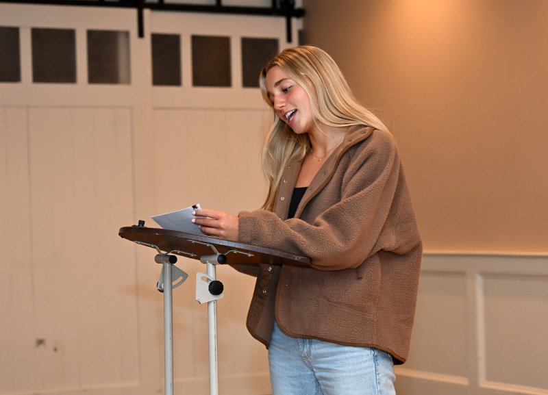 Cape varsity player Mikaela Gordon reads a letter from varsity assistant and her father John who was out of the country.