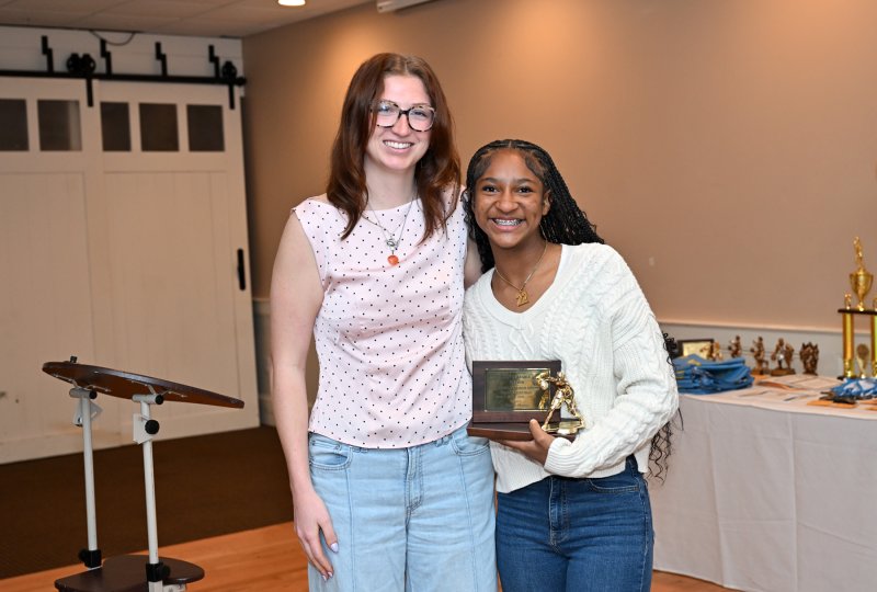 Cape JV coach Carlin Quinn presents the JV MVP Award to Natalie Horsey.