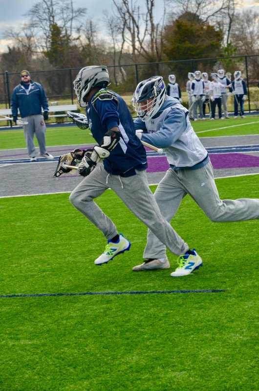 Seahawks senior Chase Ballinger gives a JV player a taste of a varsity clear.