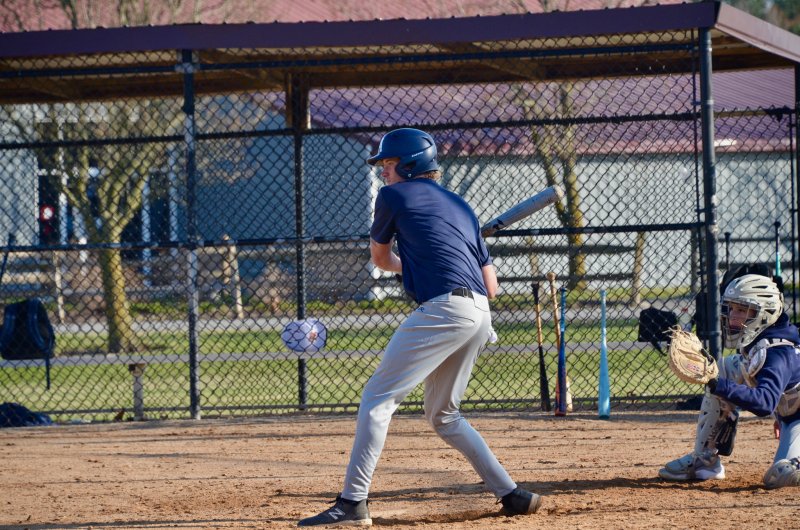 Sussex Academy senior Maddox Roberts takes a cut.