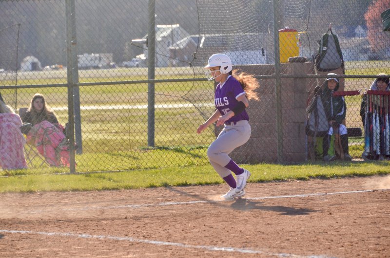 Royals freshman Violet Ryan scores the second run for Delmarva Christian in the fifth inning on a wild pitch.
