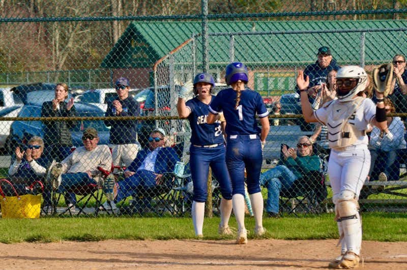Sussex Academy senior Delainie Monitzer gives the green light as Teagan Forester scores during the Seahawks’ 15-14 come-from-behind victory over Indian River March 26. AARON R. MUSHRUSH PHOTOS