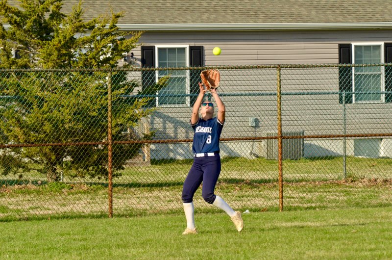Seahawks senior Ryan Lowe looks the ball into her glove.