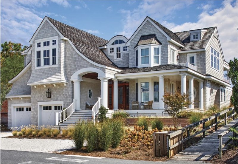 Evoking the vernacular of shingled seaside homes and cottages of the New England coast, Becker Morgan Group’s Delaware oceanfront home design melds traditional forms and elements with graceful curves and subtle whimsical details. SUBMITTED PHOTO