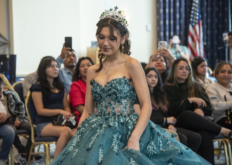 Maria Calles strolls down the runway for the gathered crowd.