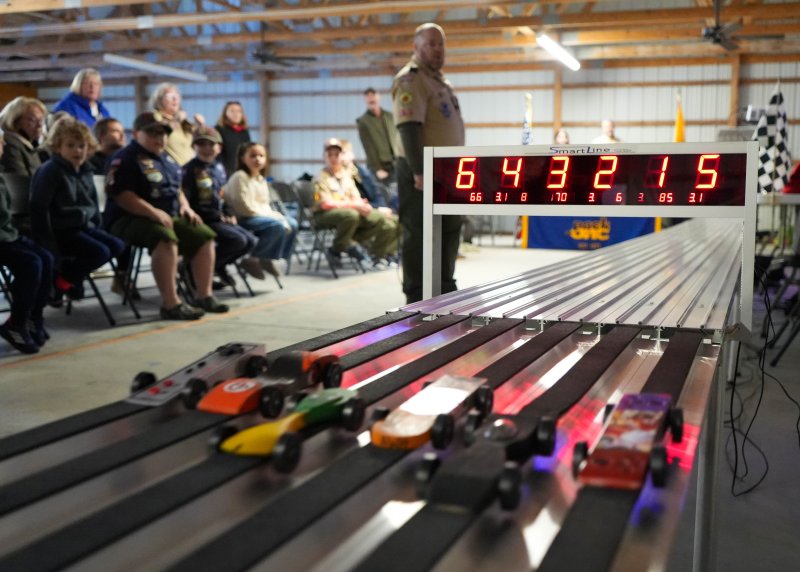 Six cars battle it out in the final race of the Lewes Pack 1 Cub Scouts’ annual Pinewood Derby Feb. 28 at Holly Lake Campsites Meeting Hall in Millsboro. ELLEN MCINTYRE PHOTOS