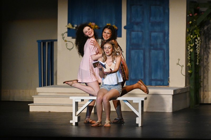 Bride-to-be Sophie, played by Willow DiMichele, reads her mother’s diary with friends Lisa and Ali, played by Briana Vargas and Alayna Pastor. NICK ROTH PHOTOS