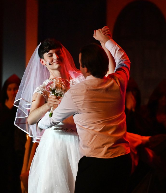 Sky, played by Owen Sponaugle, is dressed up as a bride during this dream sequence.